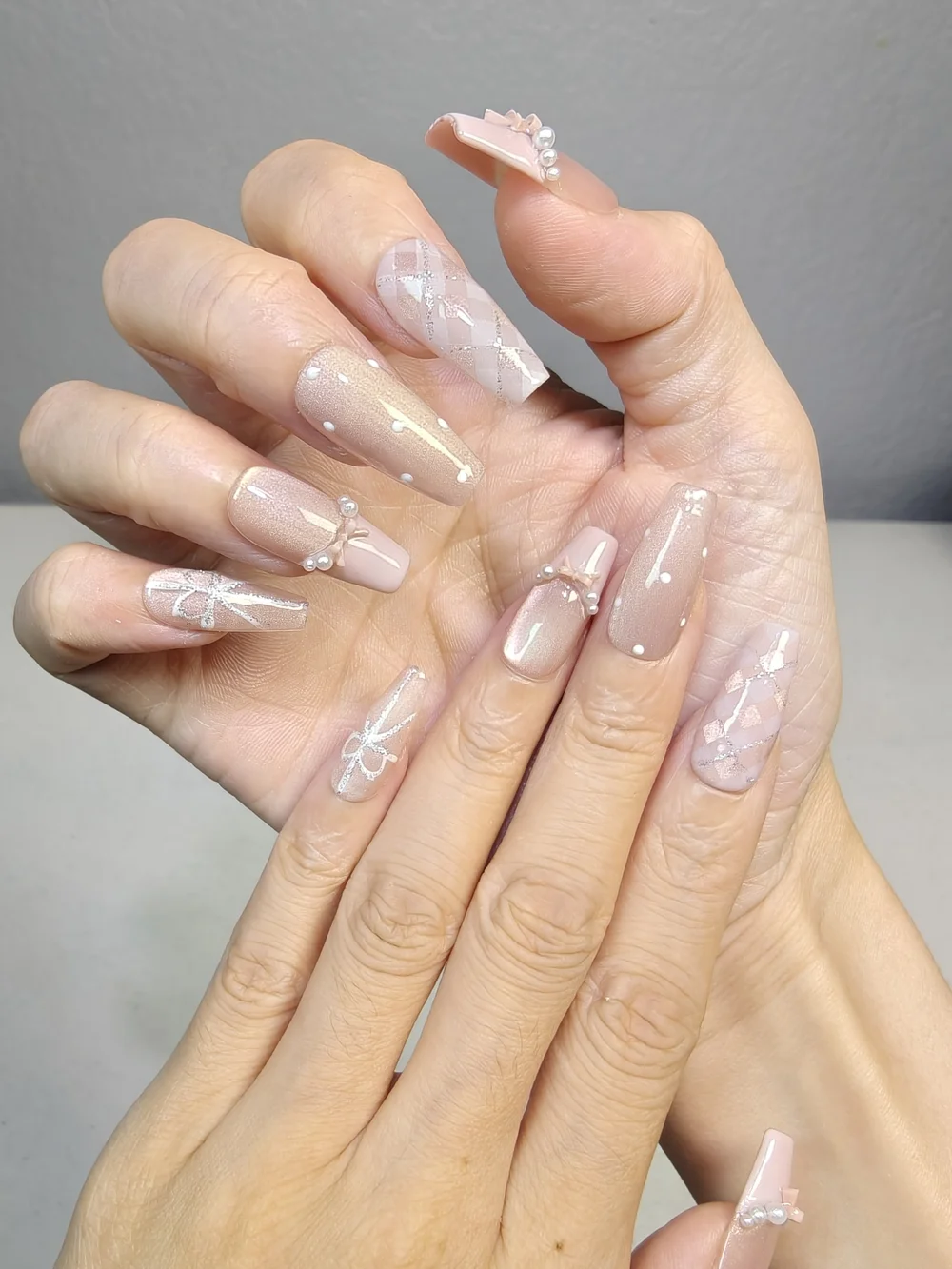 Nude‑Pink Long Coffin Press On Nails With Pink Bows Pearls & Polka Dot